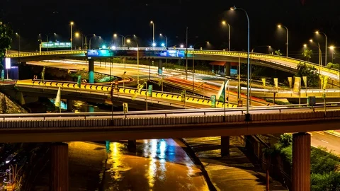 4K Time-lapse of traffic on freeway interchange at night in Kuala Lumpur Stock Footage 93880684
