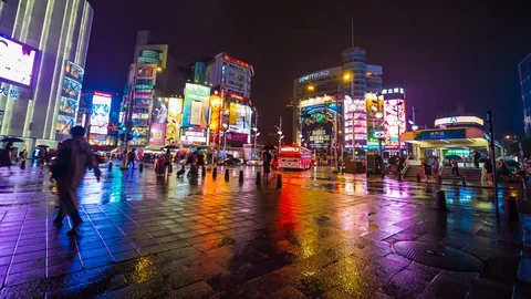 4k Time-lapse of Traffic on road with falling rain in Ximen district at night Stock-Footage 128326993