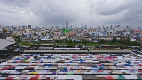 4K time lapse of train Night Market Ratchada (Talad Rot Fai) very famous Shop Stock Footage 116783297