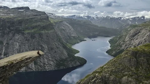 4K Time-lapse of Trolltunga with People Stock Footage 101041647