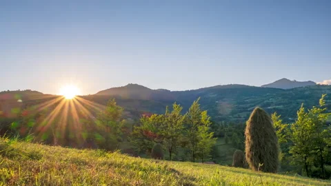 4k time lapse video of beautiful sunset over rural landscape Stock Footage 135257672
