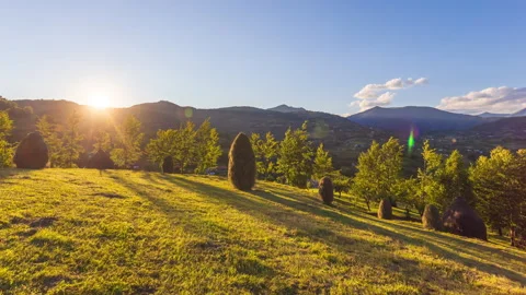 4k time lapse video of beautiful sunset over rural landscape Stock Footage 135298309