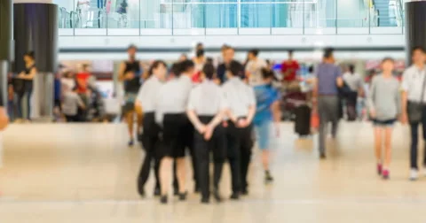 4k time lapse video of commuters in an airport Stock Footage 64769819