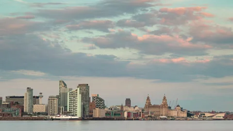 4K time lapse video of the full moon rising over the Liverpool skyline Stock Footage 308950202