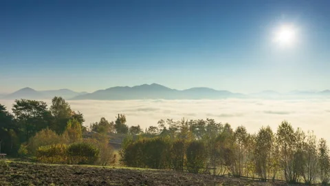 4k time lapse video of rising fog on beautiful rural landscape Stock Footage 142324864