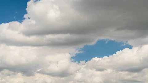4K Time lapse video Scene of A group of fluffy white clouds movement whit blu Stock Footage 154860887