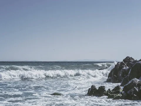 4k time-lapse video of sea waves crashing on stones. Stock Footage 80306409