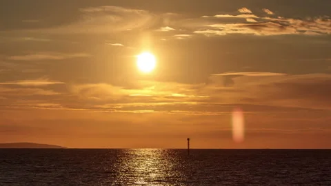 4K time lapse video of sunset over the Irish Sea from Deganwy, North Wales Video stock 334840239