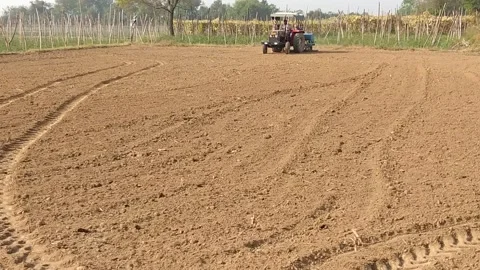 4K Time lapse Video of tractor ploughing the field. Stock Footage 142950574