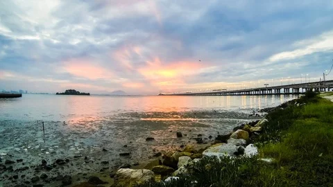 4K Time Lapse view of sunrise from Penang Bridge of George Town Stock Footage 103987420