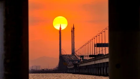 4K Time Lapse view of sunrise from Penang Bridge of George Town Stock Footage 103987431