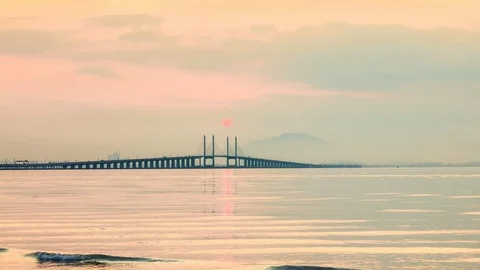 4K Time Lapse view of sunrise from Penang Bridge of George Town Stock Footage 106767833