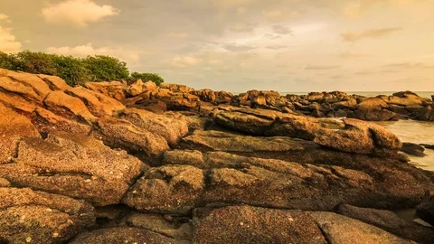 4K Time Lapse view of sunset by the shore of Sungai Batu, Penang Stock Footage 103986896