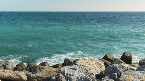 4k Time lapse of Waves splashing the rocks in turquoise Mediterranean Sea Stock Footage 46806842