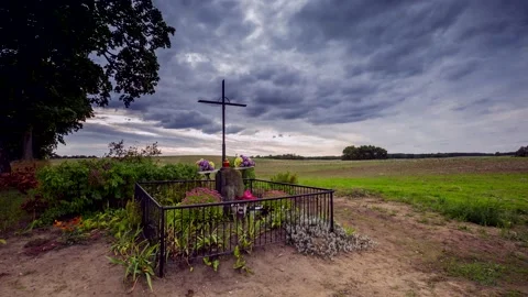 4k time lapse with wayside cross in late summer landscape. Stock Footage 154419209