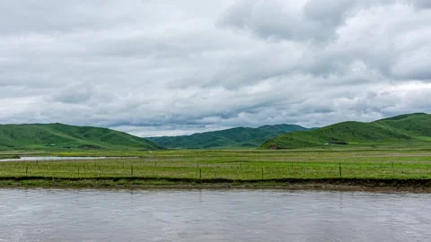 4K Time-lapse of Weather Changes Over Grassland Rivers on Cloudy Days Stock-Footage 341681370
