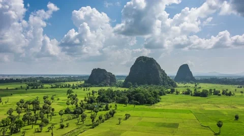 4K time-lapse of white clouds moving over beautiful rural landscape near Hpa-an, Stock Footage