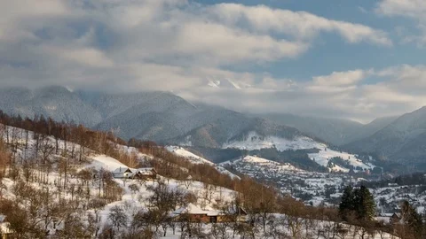 4k time lapse of white clouds over Bran village, Romania. Stock Footage 79138996