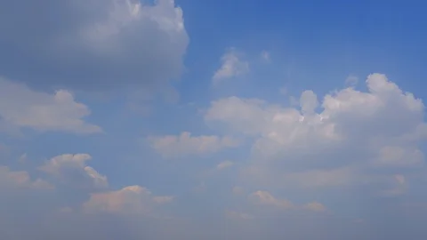 4k Time Lapse white clouds running across the blue sky. Stock Footage 104237889