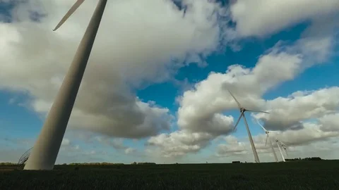 4K time lapse wind turbines for electric power production in agricultural fields Stock Footage 76112271