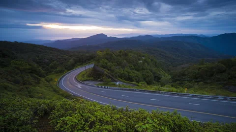 4K Time-lapse of winding mountain road in morning Stock Footage 143725502