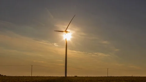 4k time-lapse with windmill silhouette in spring field sunny landscape. Stock Footage 88727108