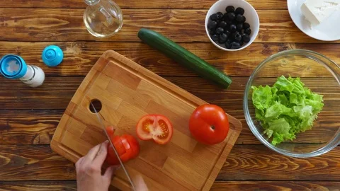 4k Time lapse of woman's hands preparing Greek salad recipe. Stock Footage 75979697