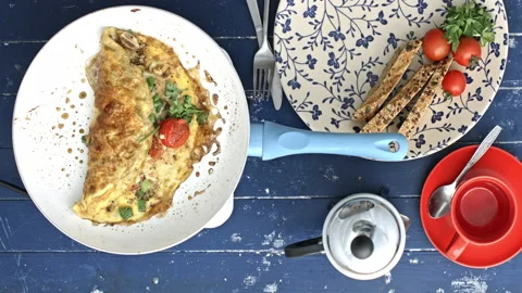 4k Time lapse of woman's hands serving a omelette breakfast with coffee and prep Stock Footage 199615839