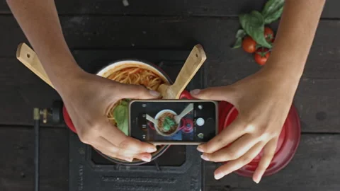 4k time lapse of woman's hands preparing spaghetti and taking a photo of plated Stock Footage 199615951