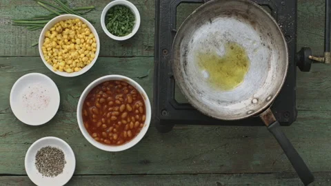 4k time lapse of woman's hands cooking Mexican food with gas stove cooker. Stock Footage 199616043
