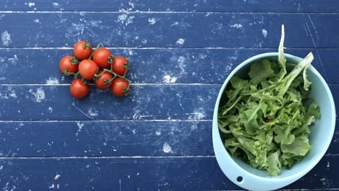 4k Time lapse of woman's hands setting out ingredients for Greek salad recipe. Stock Footage 199616361