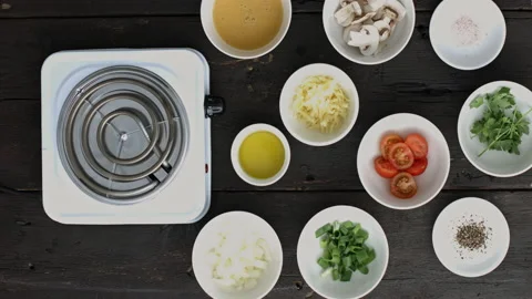 4k Time lapse of woman's hands switching on stove (smoke) while starting to prep Stock Footage 199616465