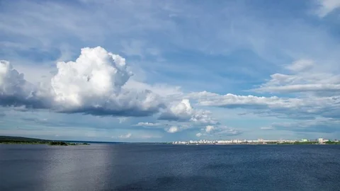 4k Time lapses of clouds on the Kama River, Kama Reservoir, view of the city of Stock Footage 77840288
