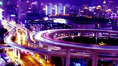 4k-Time lapse,traffic lights trail &amp; vehicles on overpass bridge at night. Stock Footage 33848571