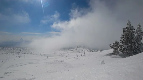 4K timelaps. mountain valley in winter. fly a thick white cloud Stock-Footage 89691046