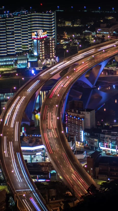 4K Timelapse aerial of highway bridge with busy traffic in nigth Taipei city Stock Footage 319155155
