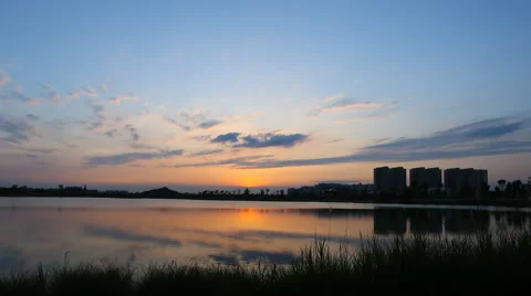 4k timelapse of beautiful sunset over a lake Stock Footage 66183313