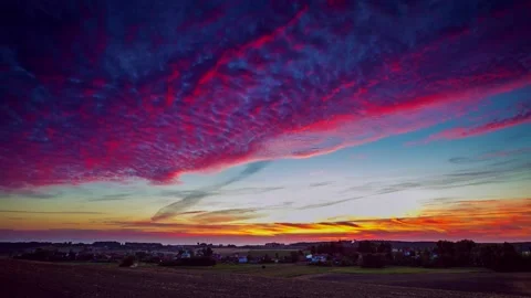 4k timelapse with beautiful sunset sky over small village in Poland. Stock Footage 154767400