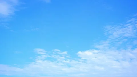 4K: Timelapse of the blue sky with white clouds. Stock Footage 303957920