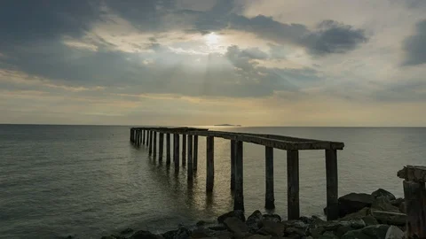 4K timelapse at brooken jetty with ray of light Stock Footage 127327899