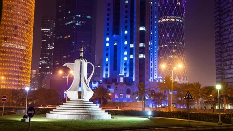 "4K Timelapse of Burj Doha and Teapot Sculpture, Qatar, Night" Stock Footage 94676084