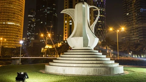 "4K Timelapse Of Burj Doha And Teapot Sculpture, Qatar, Night, vertical pan" Video stock 100843127