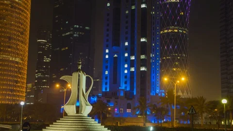 "4K Timelapse Of Burj Doha And Teapot Sculpture, Qatar, Night, vertical pan" Stock Footage 100843275