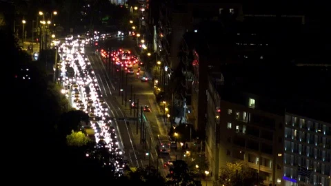 4K Timelapse bustling car traffic on busy avenue by night Athens town commuter Stock Footage 70734644