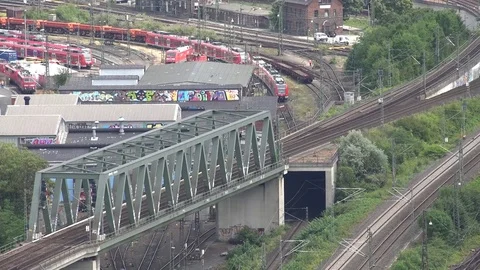 4K Timelapse busy railway infrastructure in Koln local train transit people trip Video stock 70236769