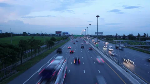 4K timelapse of busy traffic on road or highway day to night Stock-Footage 45679059