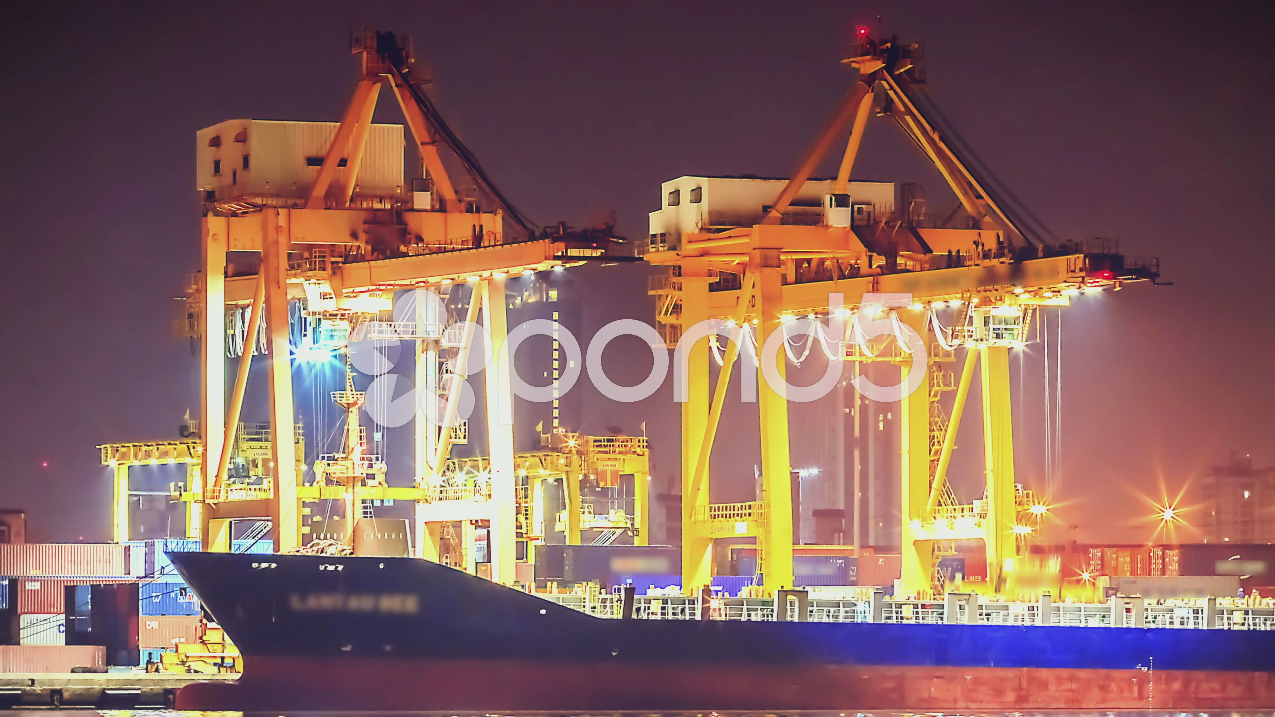 Container Ship Working At Night Business Import Export Logistic And  Transportation Of International By Container Ship In The Open Sea Aerial  View Industrial Crane Loading Cargo Freight Seaport Stock Photo - Download
