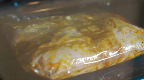 4K Timelapse of a Chicken in packet for roasting Stock Footage 57942592