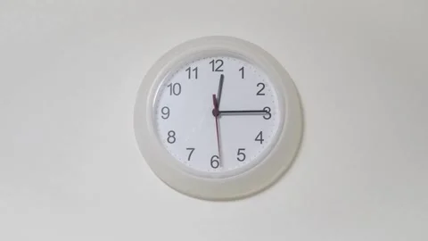 4K Timelapse of Clock pass through hour Analog Alarm Clock Almost Striking movie Stock Footage 336445144