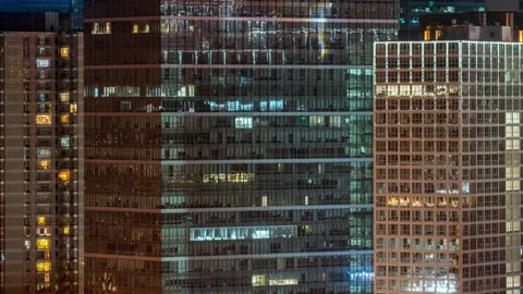4K Timelapse Close-up of Illuminated Office Buildings in Beijing Stock Footage 257927437